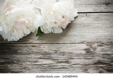 peony on wooden background