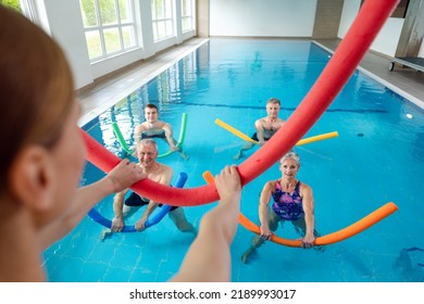 People In Aqua Fitness Class During A Physical Therapy Session