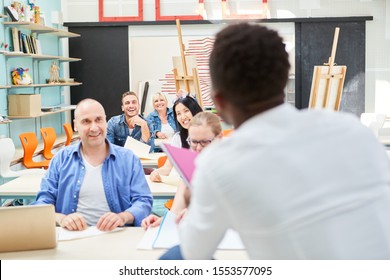 People In An Art Class Or Seminar For Further Education In The Community College