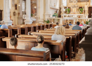 People attend a religious service in a historic church during a serene Sunday morning - Powered by Shutterstock