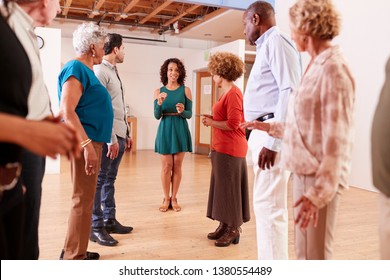 People Attending Dance Class In Community Center