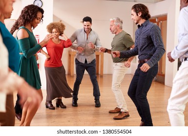 People Attending Dance Class In Community Center