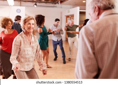 People Attending Dance Class In Community Center