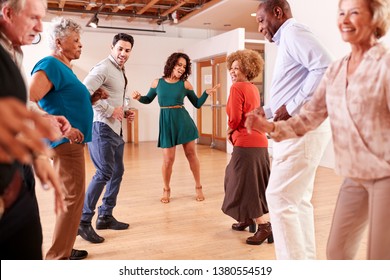 People Attending Dance Class In Community Center