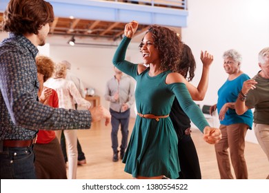 People Attending Dance Class In Community Center