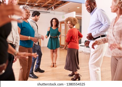 People Attending Dance Class In Community Center