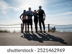 People, back and bonding with view in hiking on mountain or hill as victory on road for exercise. Group, freedom and excited for workout, running club and sport team for outdoor adventure or training