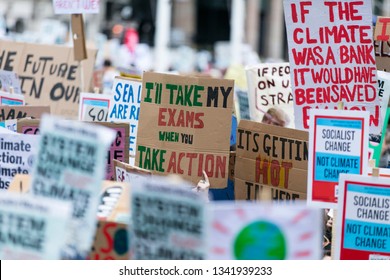 People With Banners Protest As Part Of A Climate Change March