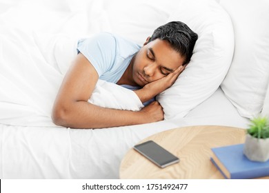 People, Bedtime And Rest Concept - Indian Man Sleeping In Bed At Home