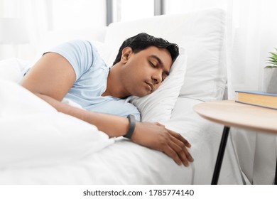 People, Bedtime And Rest Concept - Indian Man Sleeping In Bed At Home