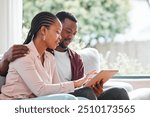 People, black couple and smile with tablet on sofa at home with browsing internet for house insurance options. Family, relationship and happy or satisfied on website for life policy and funeral cover