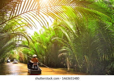 People Boating In The Delta Of Mekong River, Vietnam, Asia