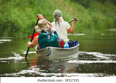 People Boating On River