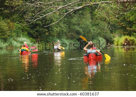 People boating on river, peacefull nature scene