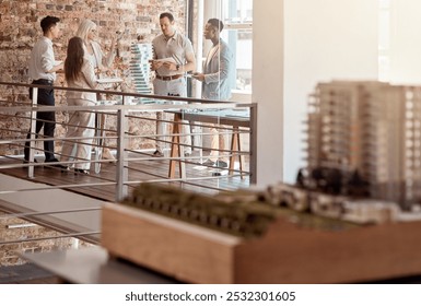 People, building model and architecture meeting in office for planning, urban development and creative with tech. Engineer team, discussion and 3D design in firm for property construction in industry - Powered by Shutterstock