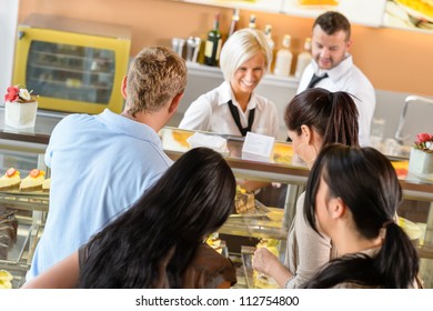 People Buying Cakes At Cafe Bar Queue Women  Display Dessert