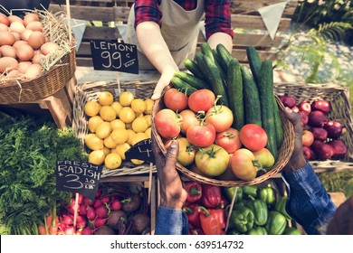 People Buying Fresh Local Vegetable From Farm at Market