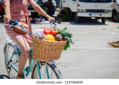 People buying fruits and vegetables ingredient. Summer outdoors farm market shopping background. Casual purchasing selling real natural healthy lifestyle candid closeup image.