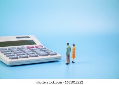 People And Calculators In Solid Background