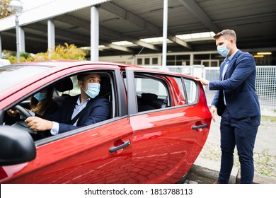 People Carpooling And Car Sharing With Face Masks - Shutterstock ID 1813788113