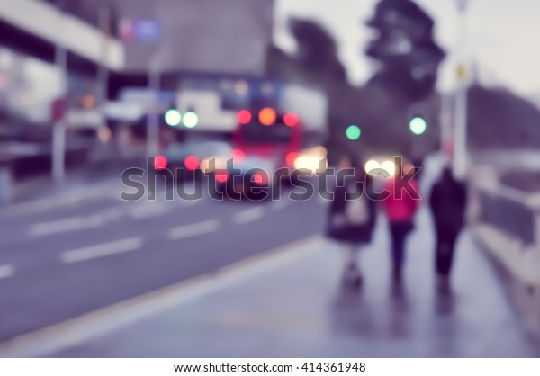 People and cars during rush\
hour.Ã?Â Streets of big city during rush hour in urban business\
area.
