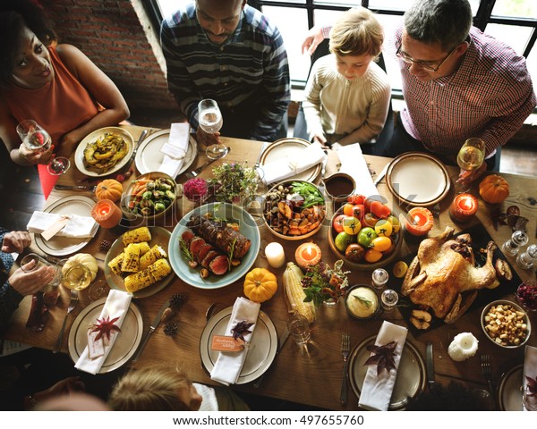 People Celebrating Thanksgiving Holiday Tradition Concept Stock Photo