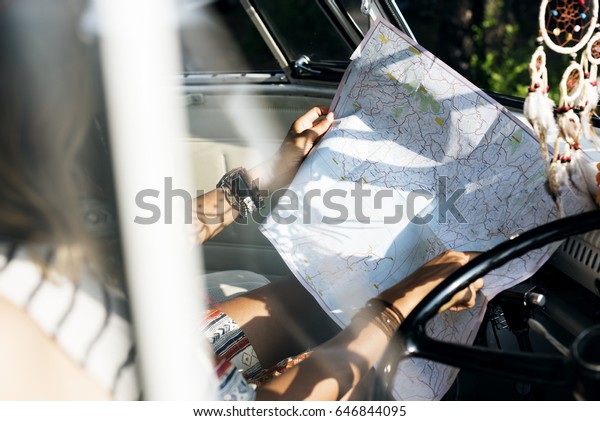 People\
Checking The Map for Direction on Road\
Trip