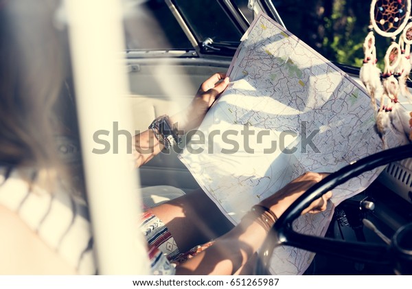 People\
Checking The Map for Direction on Road\
Trip