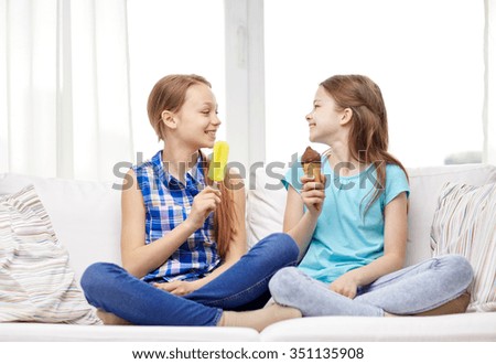 Similar – Two kids sitting on a bench and admiring the scenery