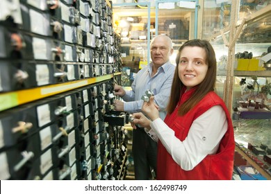 People Chooses Fasteners In  Auto Parts Store