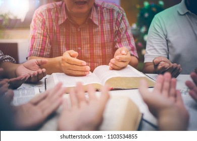 People of Christ congregations in prayer with upturned palms Holy Scriptures blessings of God. Everyone worked together to the Church, The concept of spirituality and religion. - Shutterstock ID 1103534855