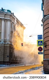 People Clean Snow From The Roof Of A House In The City Center In The Morning. The Municipal Service Throws Snow Off The Roof. Saint Petersburg, Russia - 5 Dec 2021