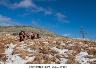 People Climb The Trail Uphill