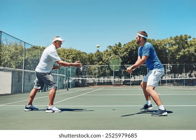 People, coach serve and outdoor fitness on tennis court, training session and together for practice. Men, athlete mentor and exercise at sports club with equipment, teamwork and competition workout - Powered by Shutterstock