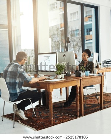 People, computer or typing in office for creativity, market research or storytelling at creative agency. Team, diversity or tech screen at table for SEO, brainstorming or proofreading article in city