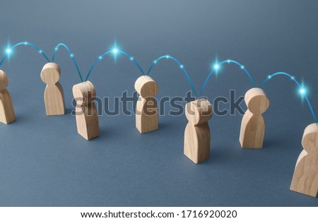 People are connected by a chain of connections. Communication and information transfer. Cooperation, collaboration. Production chain, customers and contractors. Beneficiaries. Economics and barter.