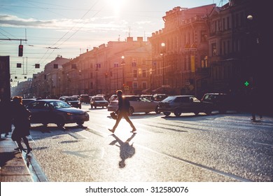 People Crossing Nevsky Prospect. Sunny Evening In Saint Petersburg, Russia. Toned Picture