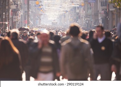 People Crowd Walking On Busy Street On Daytime