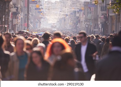 People Crowd Walking On Busy Street On Daytime