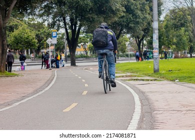 People Cycling On The Bike Route Of The 80´ Street, July 2, 2022, Bogota Colombia
