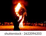 People dance in the firelight on Ivan Kupala