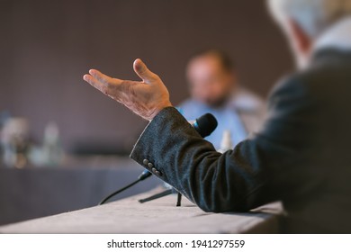 people debating at seminar presentation - Shutterstock ID 1941297559
