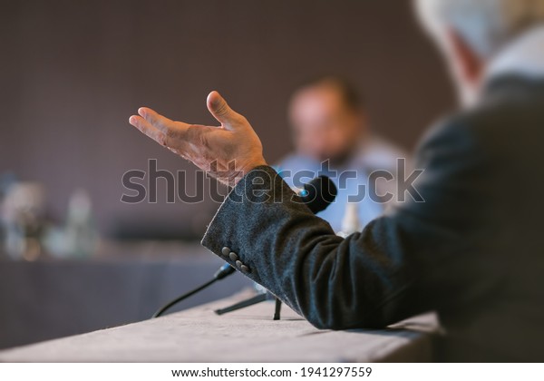 people debating at
seminar presentation