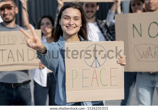 People demonstrating\
together for peace