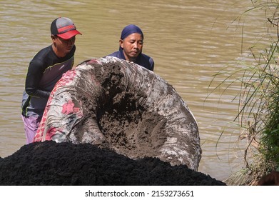 People Do Sand Mining In The River Traditionally. Tegal, Central Java, Indonesia 6 May 2022.