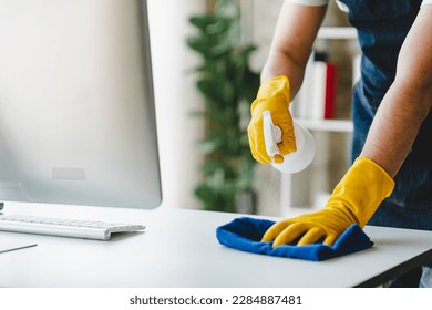 people doing cleaning are using cloths and spraying disinfectant Wipe the desk and floor in the office room.
cleaning staff
cleaning maid - Powered by Shutterstock