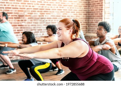 People Doing Squats In Fitness Class