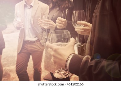 people drinking wine vintage effect, a group of friends is socializing and having a fun - Powered by Shutterstock