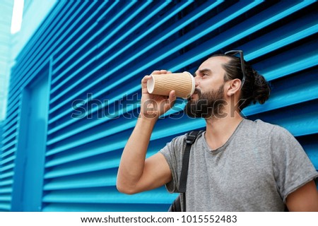 Similar – Ein Typ, der im Café Kaffee trinkt.