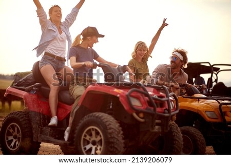People  driving quad bikes at the mountains on journey 